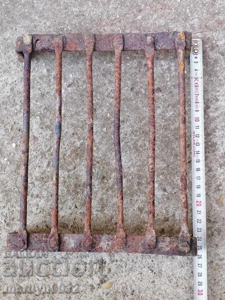 An old hand-forged grill, a steak, wrought iron - 5 An old hand-forged grill, a steak, wrought iron - 5