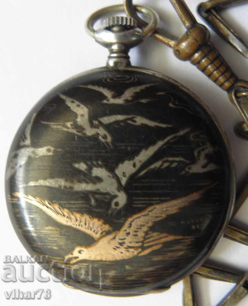 small pocket watch-folded is a winter machine