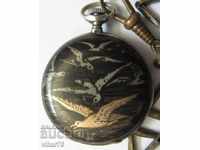 small pocket watch-folded is a winter machine
