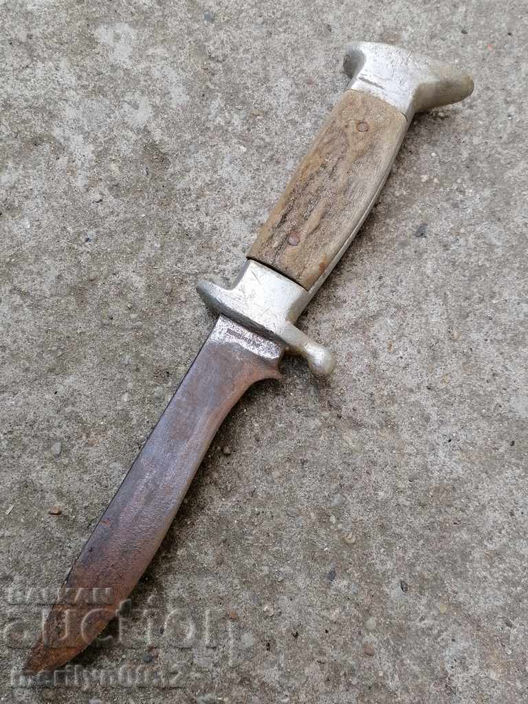 Old hunting knife Bukovets doodle, leg