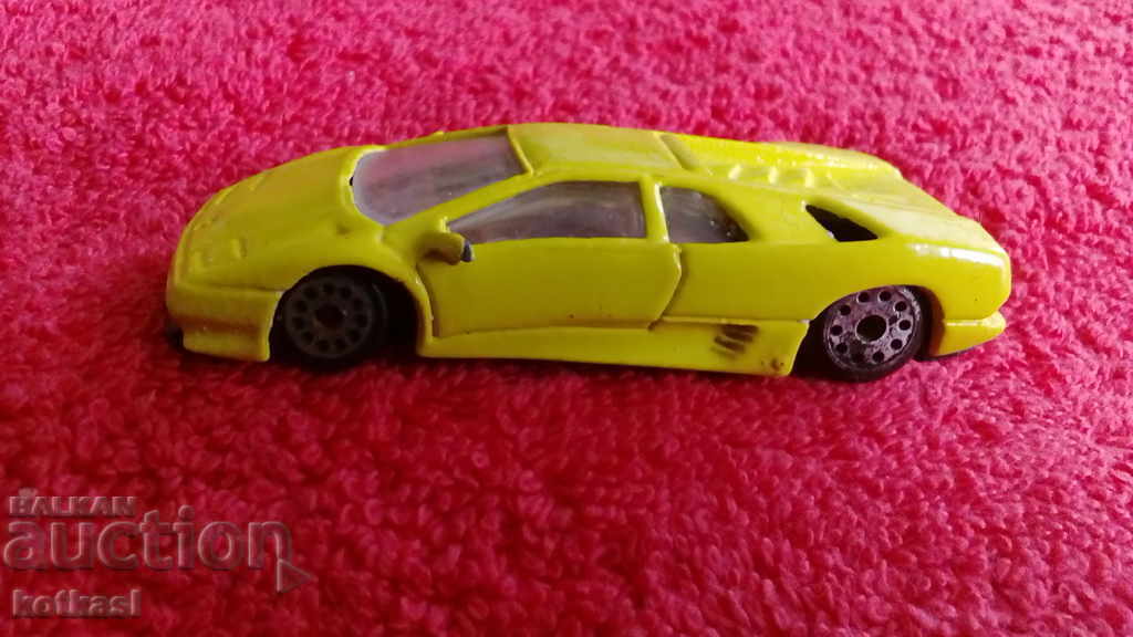 Old small metal sports car with price 8.50 BGN | € 4.35 Old small metal sports car with price 8.50 BGN | € 4.35