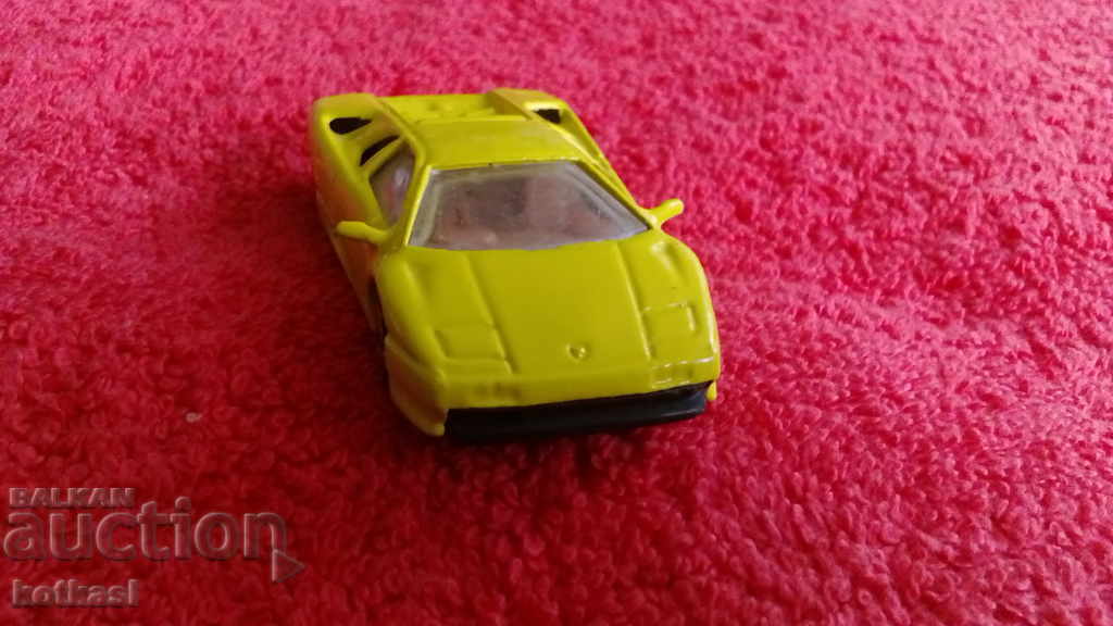 Auction Old small metal sports car Auction Old small metal sports car