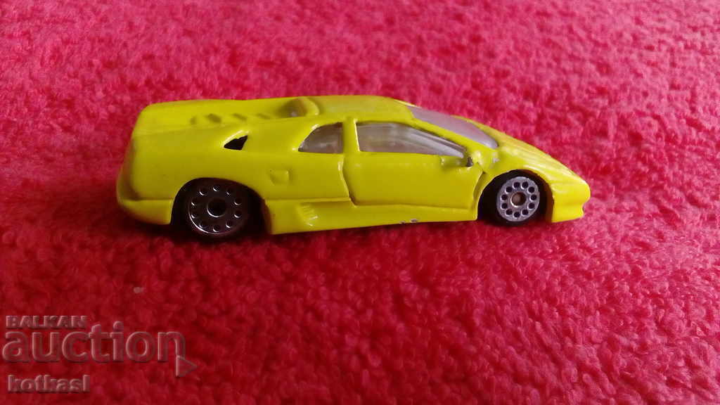 Delivery of Old small metal sports car Delivery of Old small metal sports car