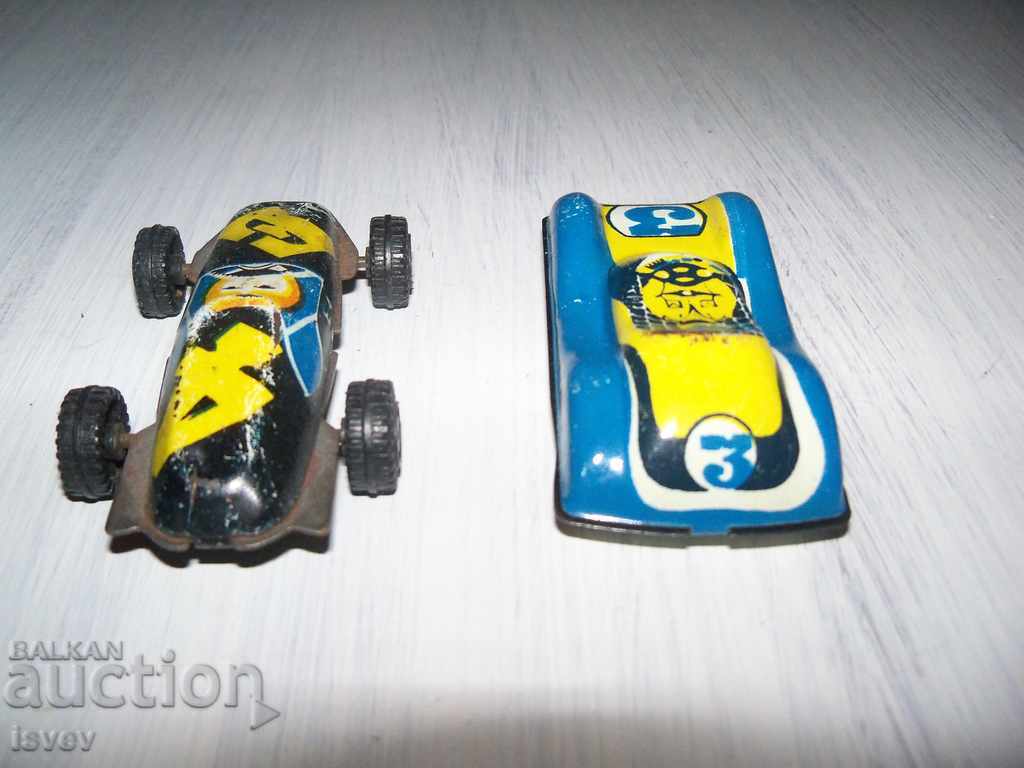 Auction Two small tin carts from the time of the sots Auction Two small tin carts from the time of the sots