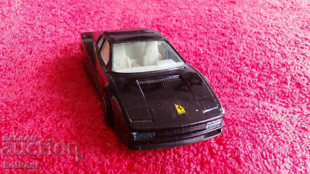 Licitație Mașină metal burago FERRARI TESTAROSSA 1/43 ITALIA Licitație Mașină metal burago FERRARI TESTAROSSA 1/43 ITALIA