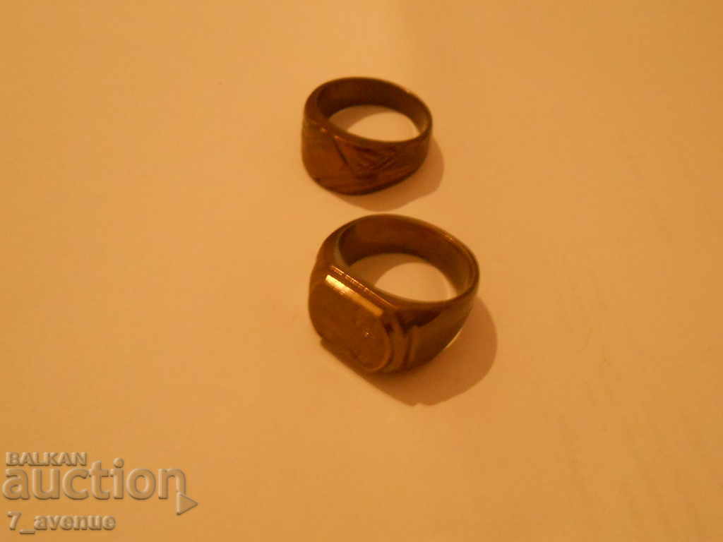 Auction  Ring two pieces, bronze with engravings, old and interesting