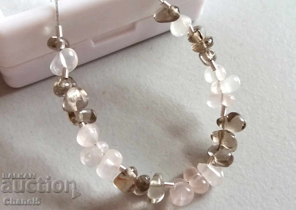 NATURAL COLORLESS AND SMOKED QUARTZ - CONNECTION - 10.15 kt (213) with price 6.90 BGN | € 3.53