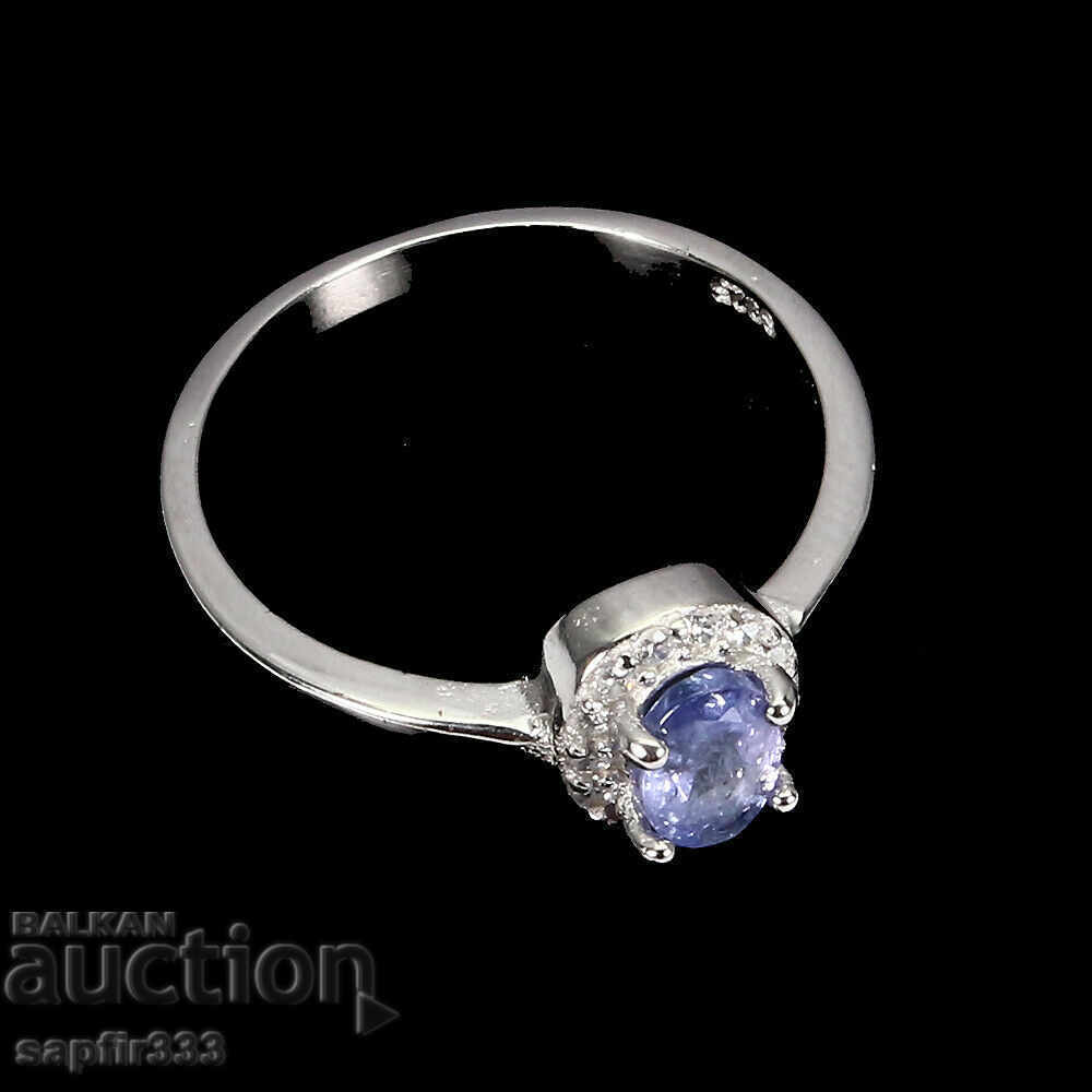 Auction ELEGANT RING WITH NATURAL TANSANITE AND ZIRCONI Auction ELEGANT RING WITH NATURAL TANSANITE AND ZIRCONI