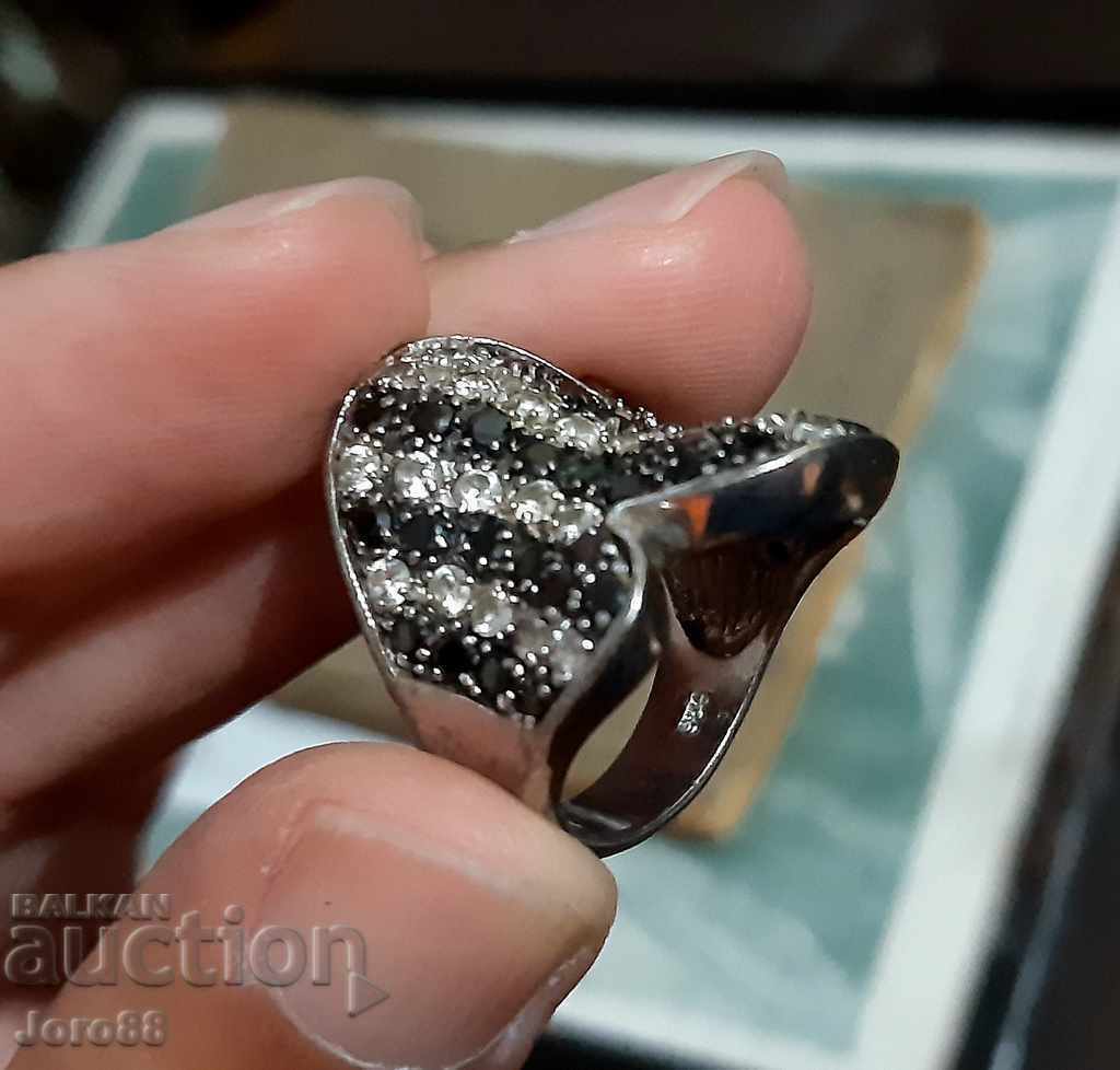 Delivery of Massive silver women's ring with stones!