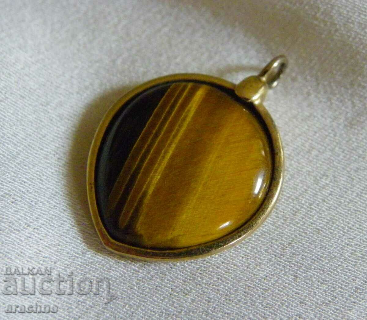 Auction Large old silver medallion with a tiger's eye Auction Large old silver medallion with a tiger's eye