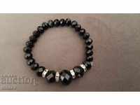 Elastic bracelet with black quartz beads