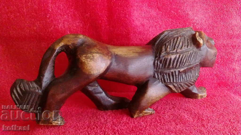 Old wood carving figure of a guardian Lion with price 265.50 BGN | € 135.75 Old wood carving figure of a guardian Lion with price 265.50 BGN | € 135.75