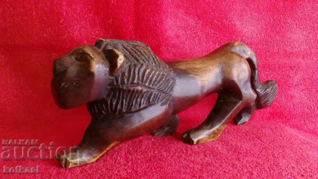 Delivery of Old wood carving figure of a guardian Lion Delivery of Old wood carving figure of a guardian Lion
