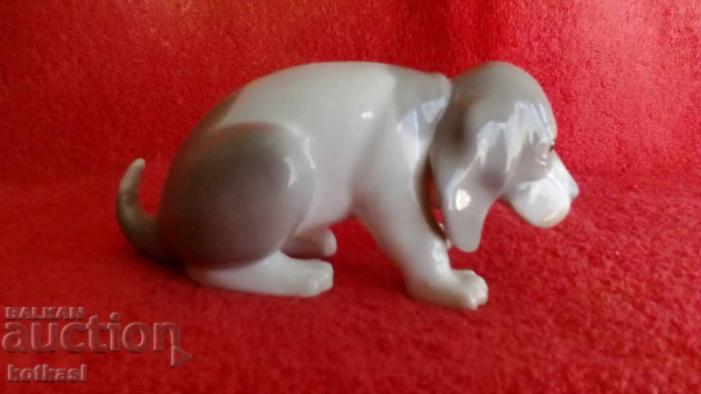 Old porcelain figure of a Dog