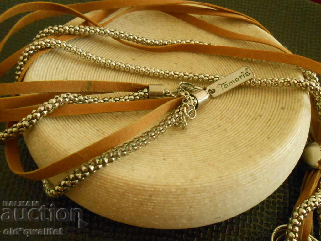 Auction  NECKLACE sophisticated, elegant, bears a stamp: TAMARIS