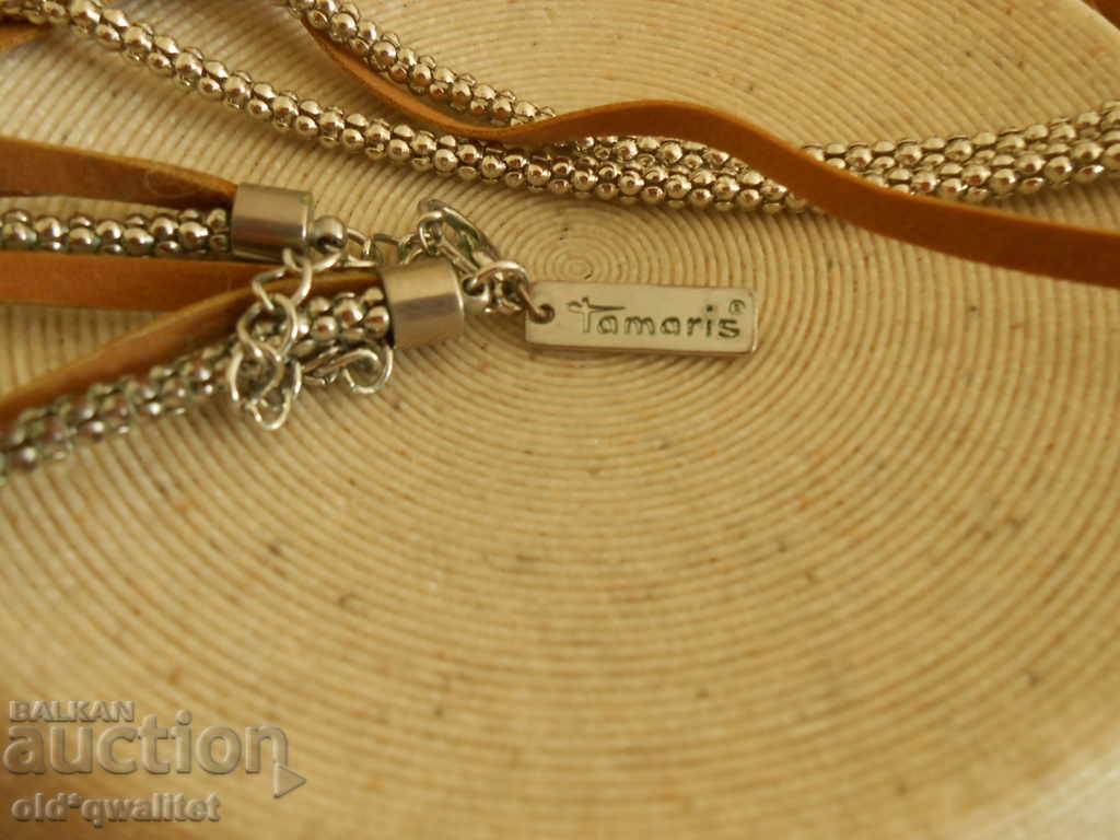 Delivery of NECKLACE sophisticated, elegant, bears a stamp: TAMARIS