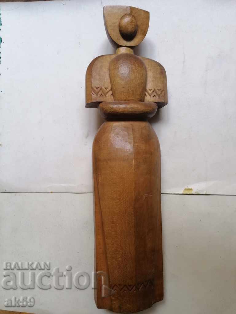 Maiden - a wooden figure.
