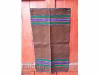 Authentic woven woolen cover. Costume