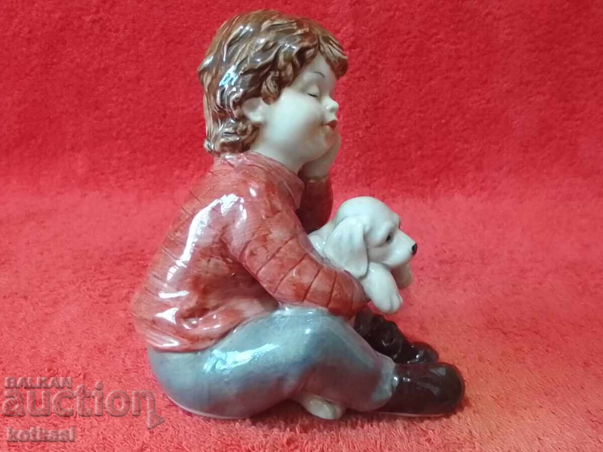 Auction  Old porcelain figure Boy with a dog