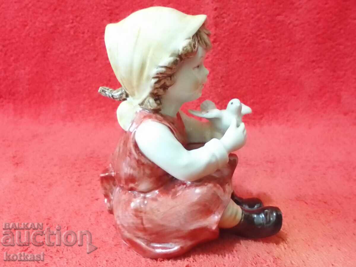 Auction Old porcelain figure Girl with a dove Auction Old porcelain figure Girl with a dove