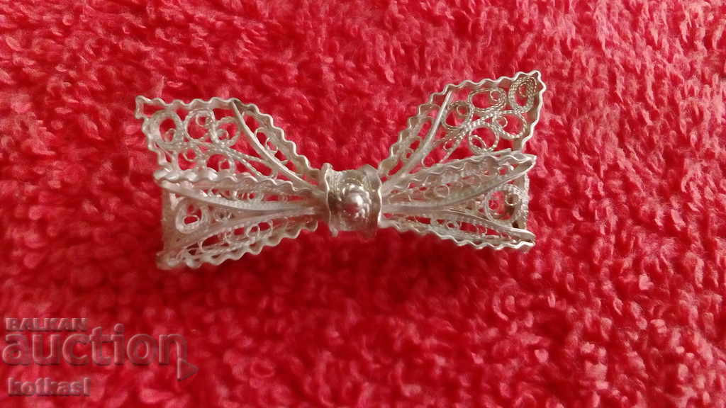 Old silver filigree ribbon brooch with price 65.50 BGN | € 33.49 Old silver filigree ribbon brooch with price 65.50 BGN | € 33.49