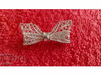Old silver filigree ribbon brooch