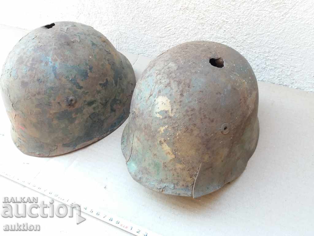 LOT OF TWO MILITARY HELMETS - BA - 5