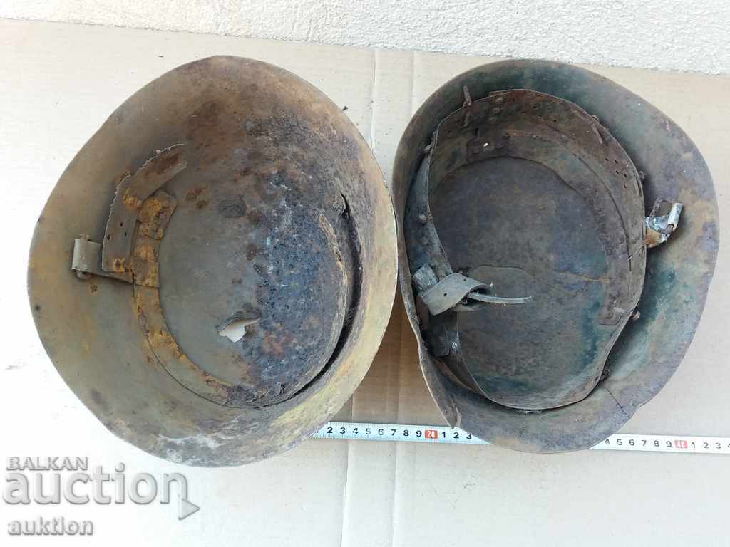 LOT OF TWO MILITARY HELMETS - BA - 7