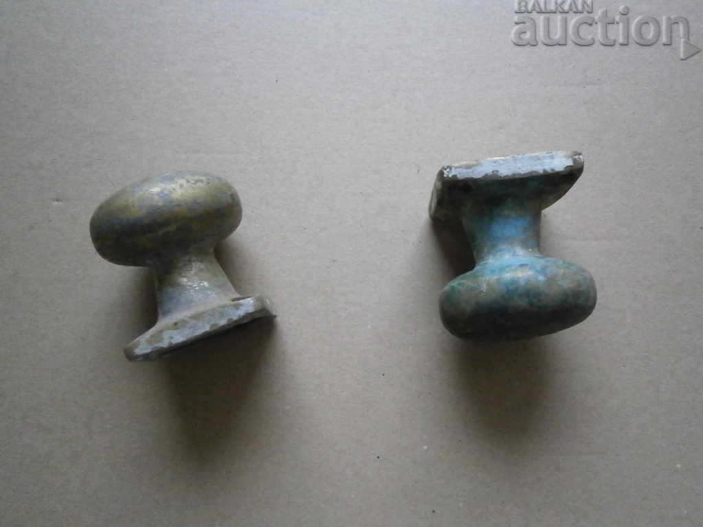 two antique bronze neck balls