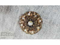 Antique gilded brooch with pearls