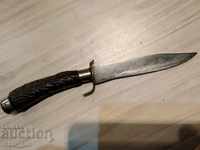 I am selling an old hunting knife.
