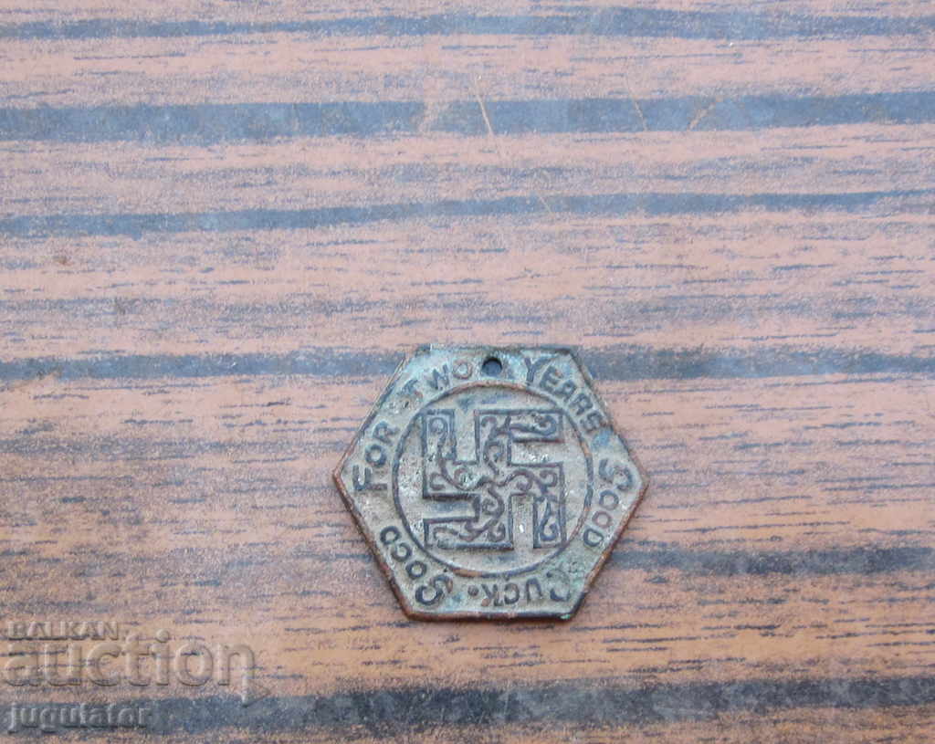 Delivery of authentic old bronze medal swastika badge