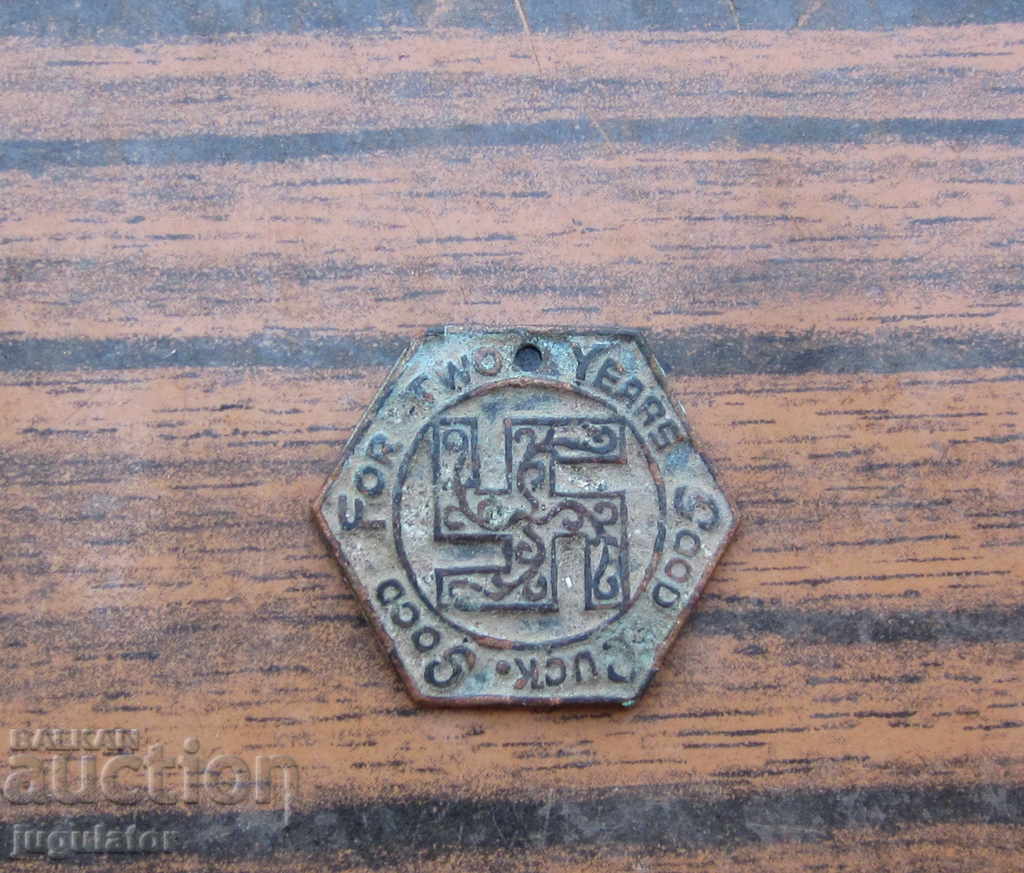 authentic old bronze medal swastika badge