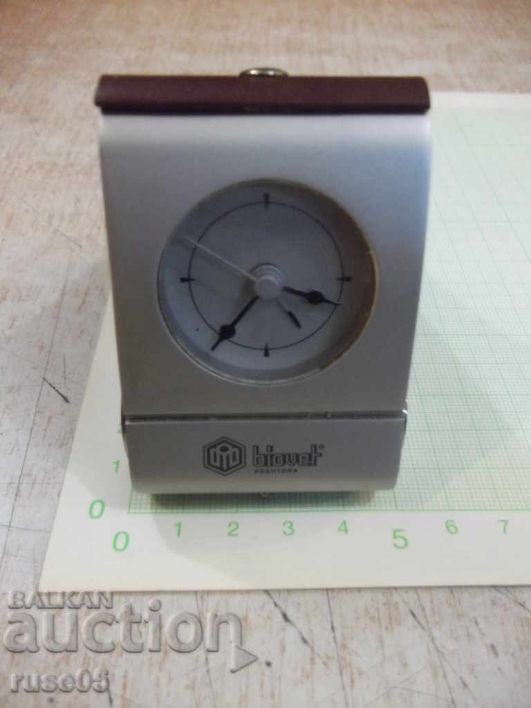 Folding quartz alarm clock