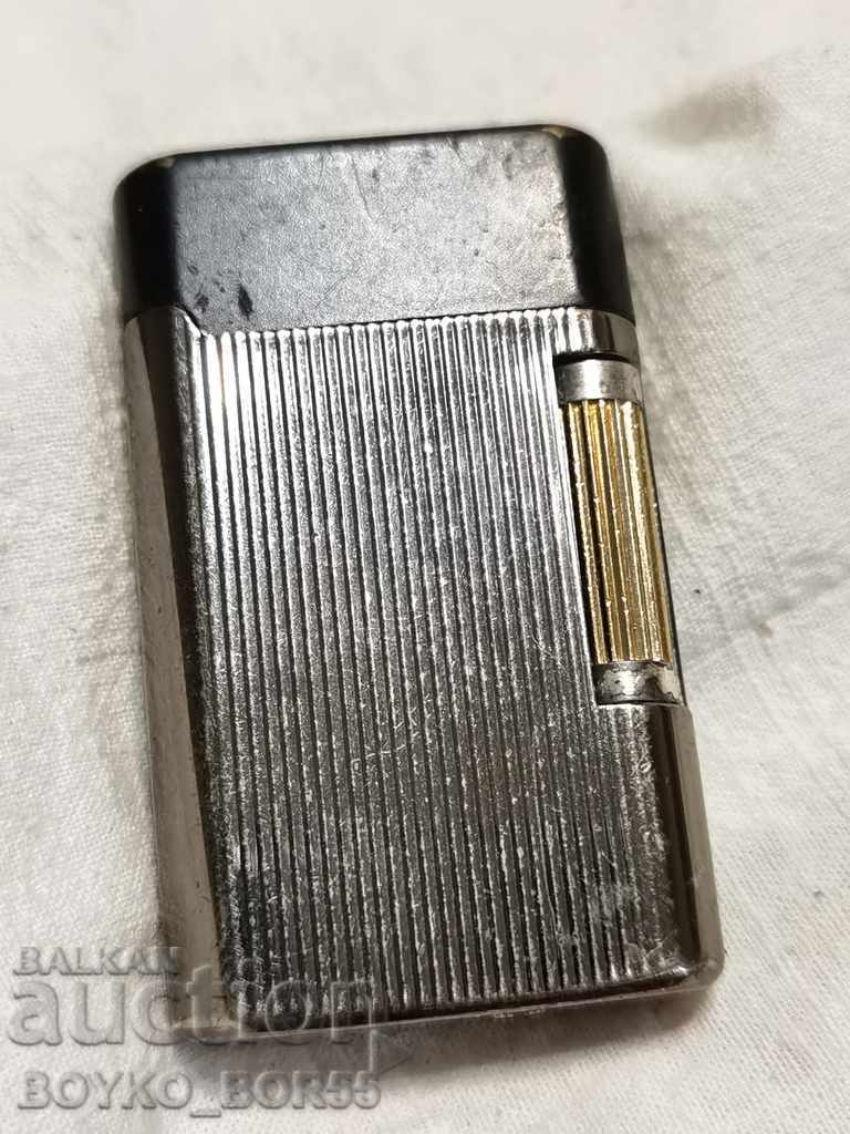 Old Lighter with Pebble