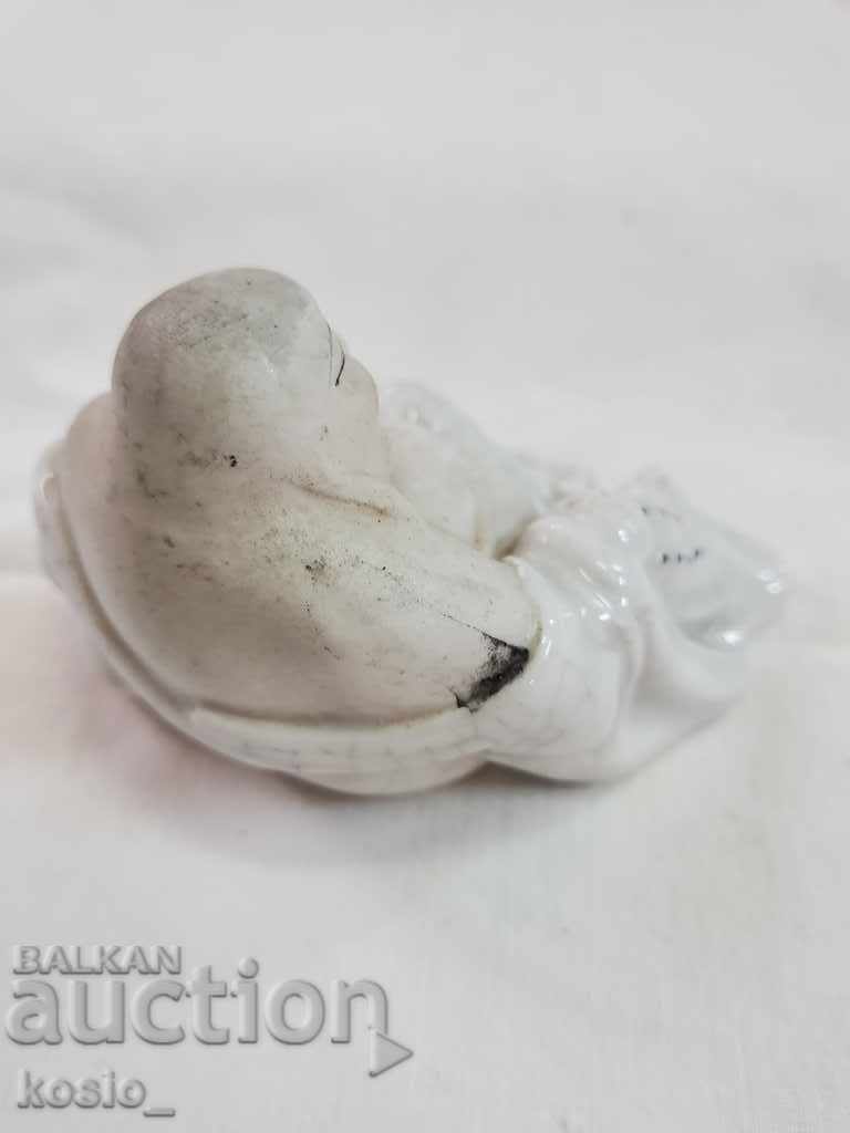 Porcelain Buddha figurine with price 20.00 BGN | € 10.23 Porcelain Buddha figurine with price 20.00 BGN | € 10.23