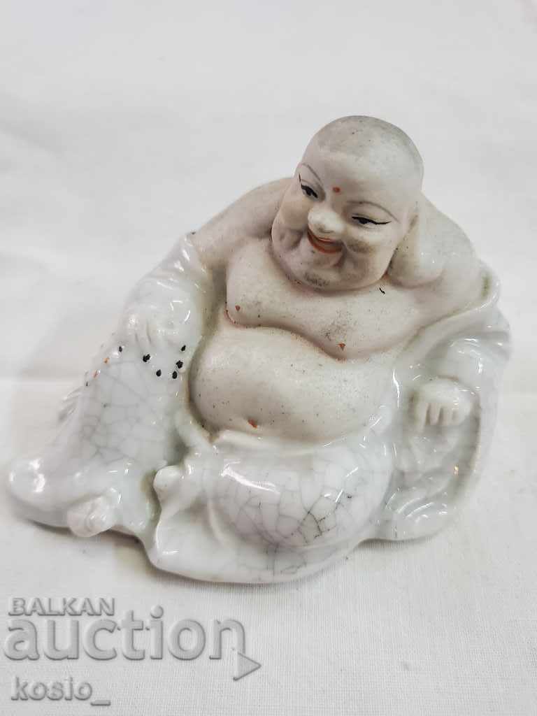 Porcelain Buddha figurine