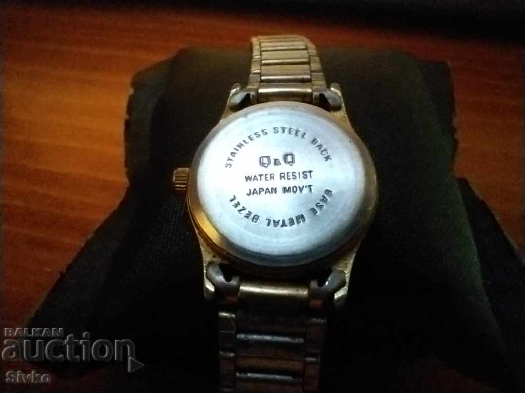 Auction The Q&Q watch is waterproof up to 30 m Auction The Q&Q watch is waterproof up to 30 m