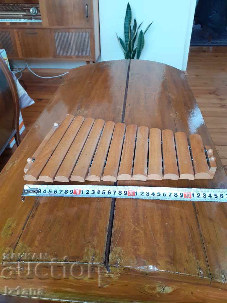 Auction An old toy, a musical instrument Auction An old toy, a musical instrument