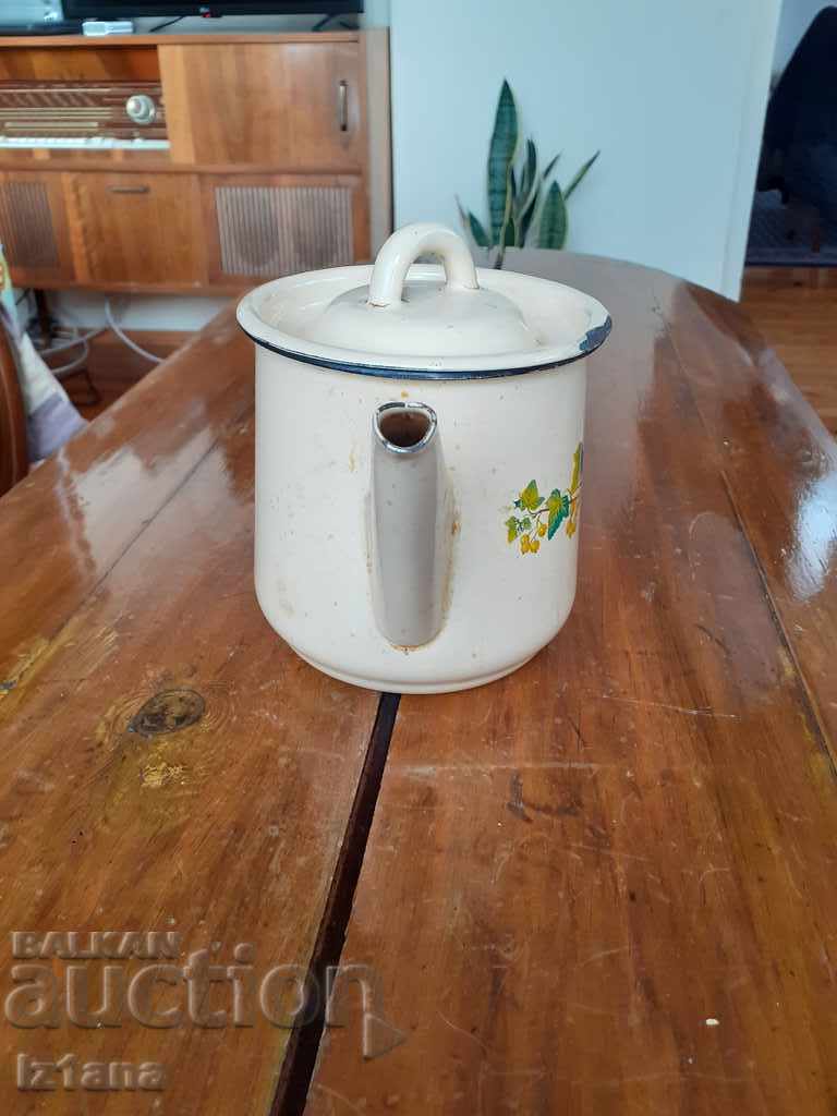 Delivery of Old enamel teapot