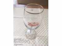 A GLASS OF BEER GLASS GOLDER RELIEF ADVERTISING