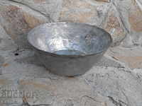 Old wrought copper bowl tas