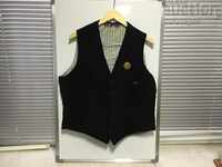 REVIVAL Old men's vest from the 20s. of the 20th Century with a BADGE