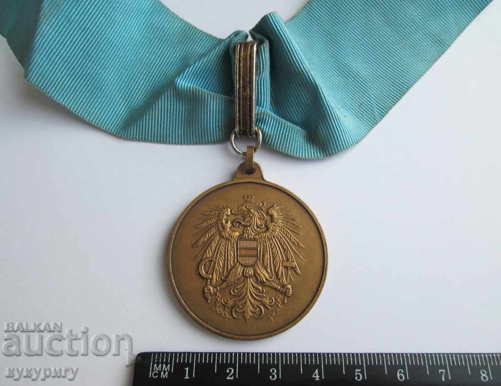 Auction Old Austrian medal medal with swords with neck strap Austria Auction Old Austrian medal medal with swords with neck strap Austria