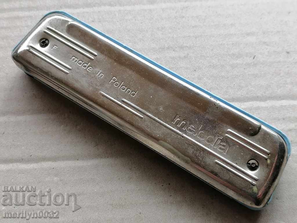 Auction  Harmony, a musical instrument Poland