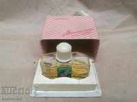 Old perfume cologne with a box of lily of the valley