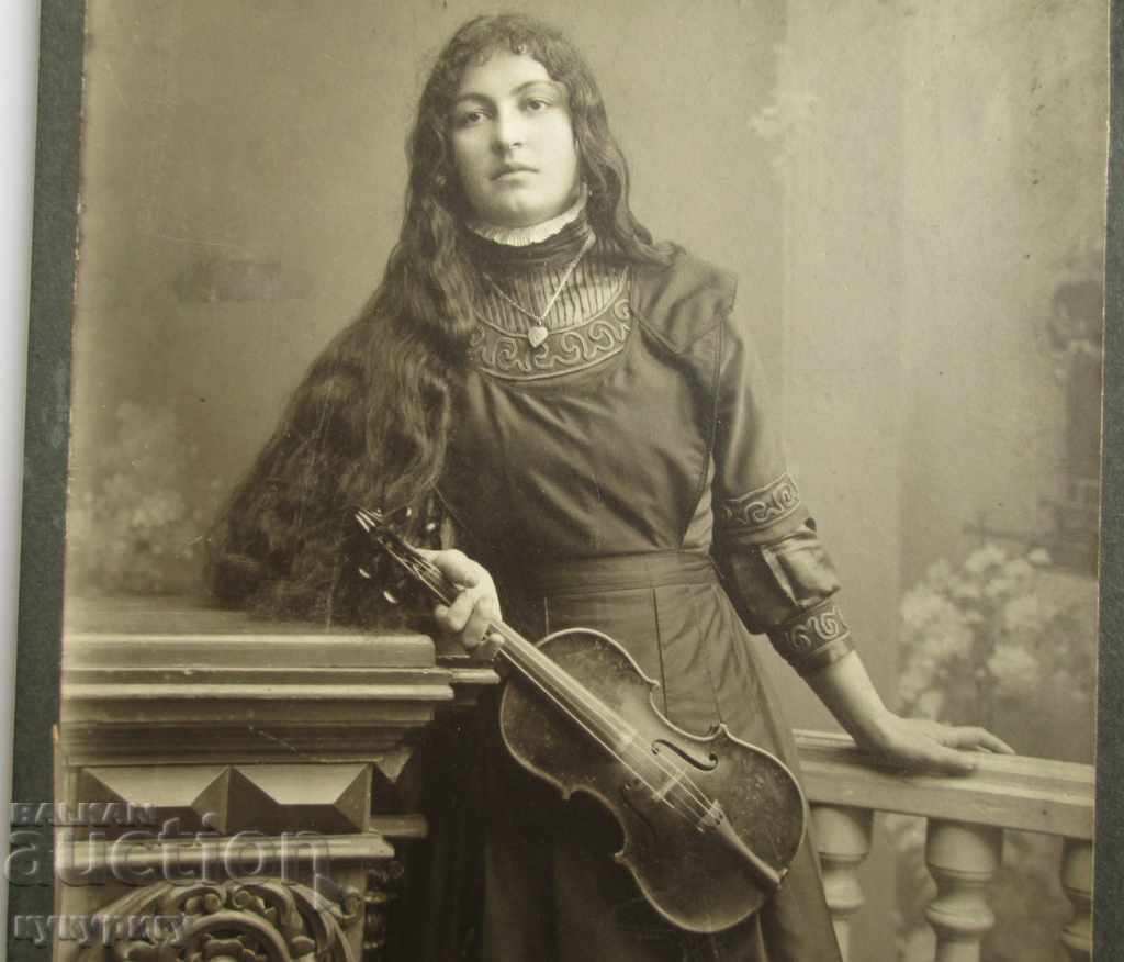 Old photo hard cardboard girl with violin Kingdom Bulgaria with price 40.00 BGN | € 20.45 Old photo hard cardboard girl with violin Kingdom Bulgaria with price 40.00 BGN | € 20.45