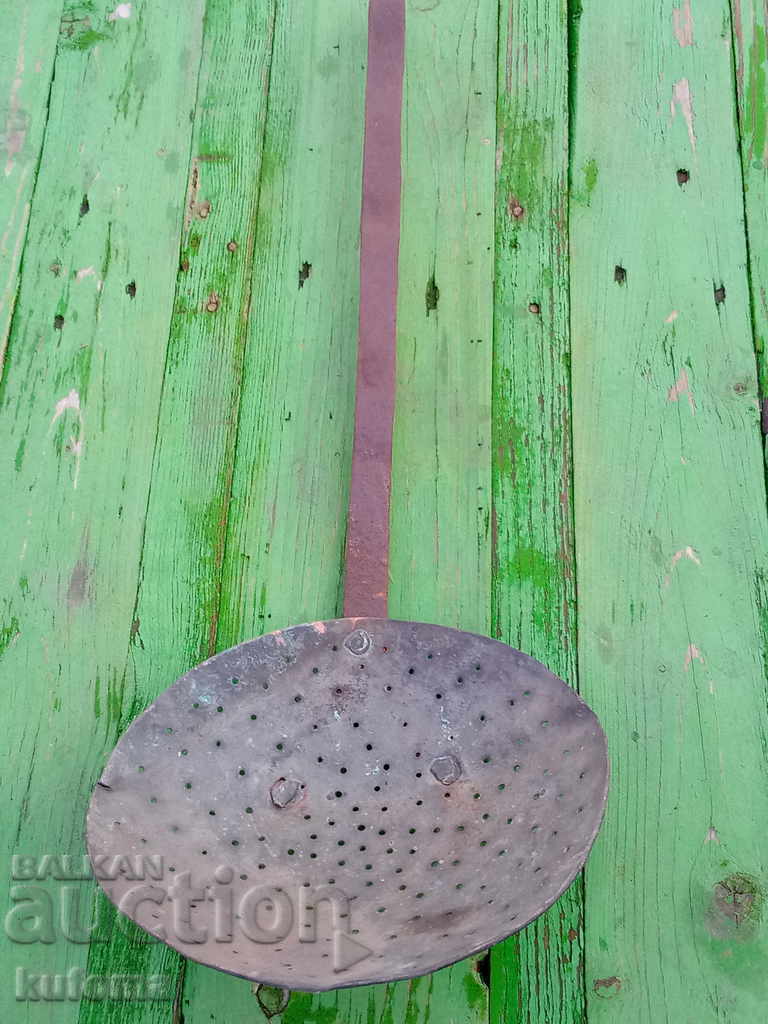 Old copper strainer