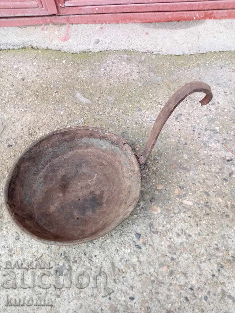 An old copper pan