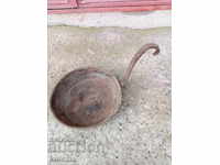 An old copper pan